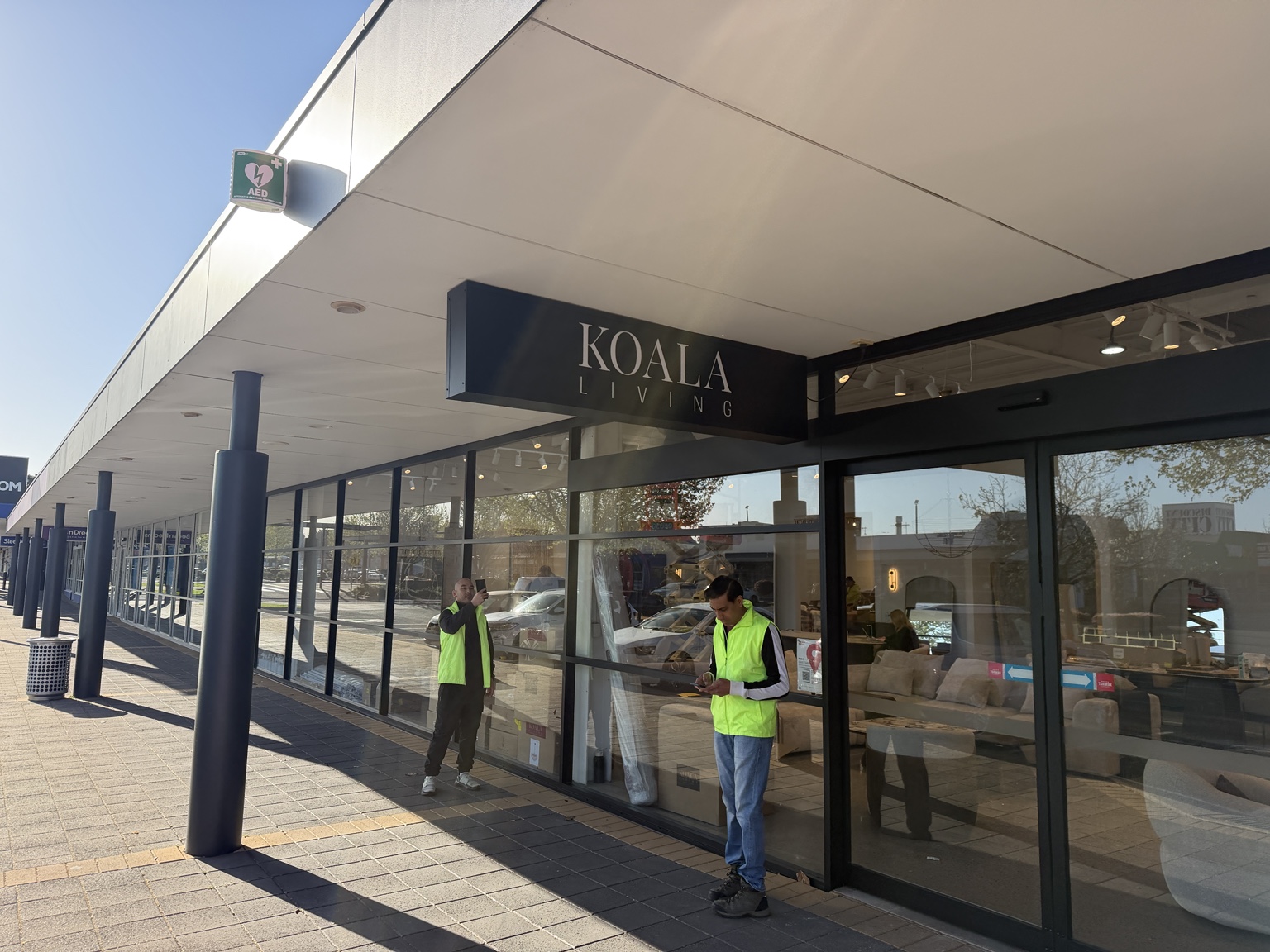 Installers working on a retail shopfront